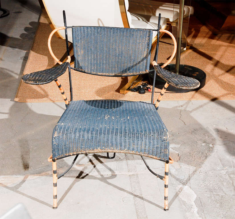 Italian '50s Modernist Lounge Chair in the Manner of Carlo Mollino. Constructed of a Black Iron Frame with Woven Cane.