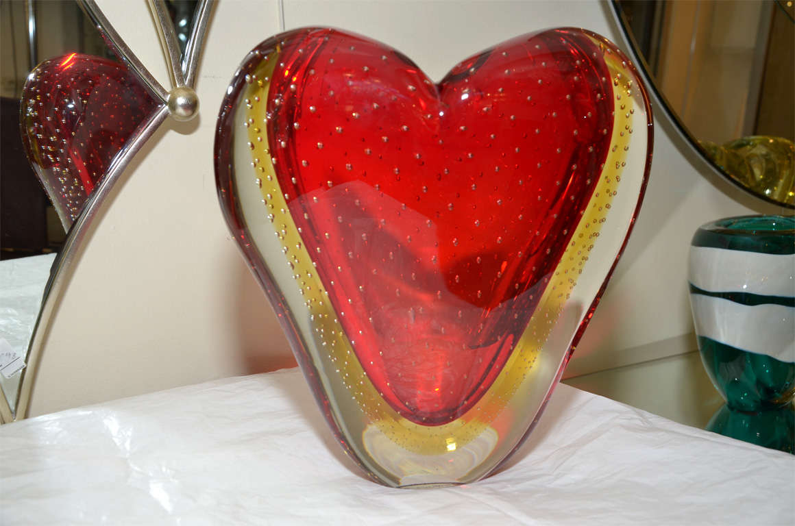 1960-1970 yellow and red bubbled Murano glass heart-shaped vase edited by Salviati. Signed but difficult to read: 