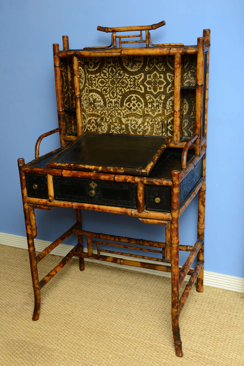 Very unusual English Bamboo desk with lacquer drop-front desk and leather paper.