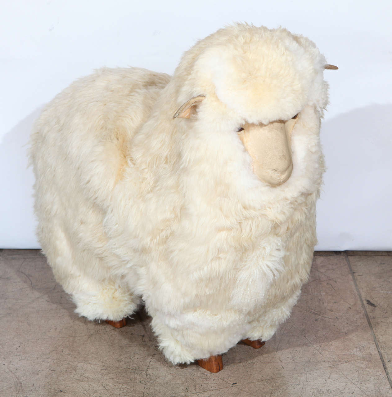 A wonderful sculpture of a sheep. Made of wood, leather, flokati wool fur. It is signed and dated 1979. See last photo.