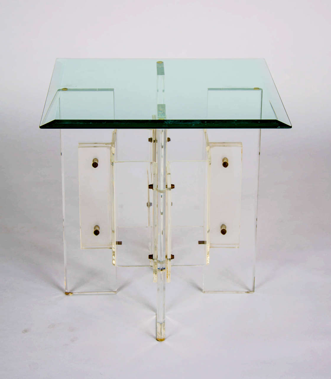 Two glass and perspex side tables from the 1970s.

Maker unknown.