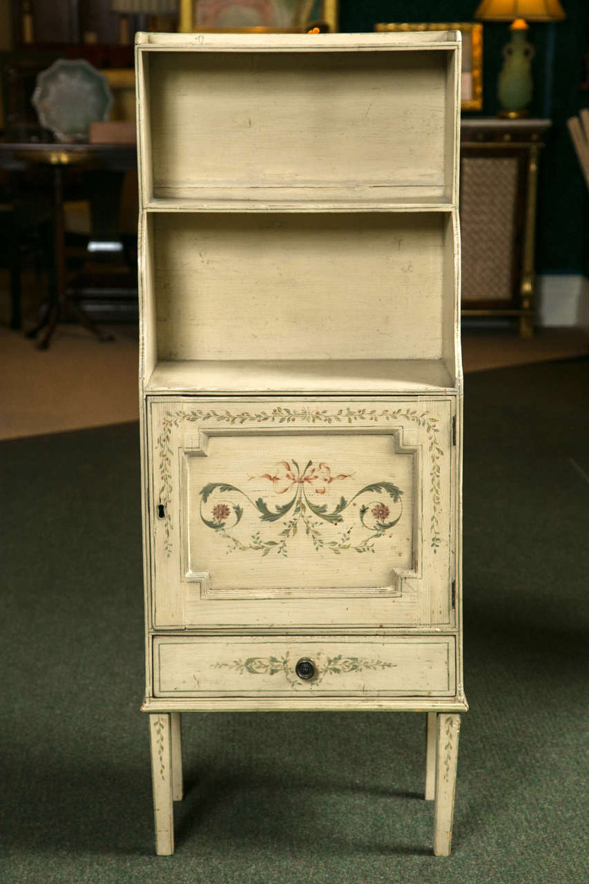 French, hand-painted cabinet with open shelves, closed cabinet on straight legs.