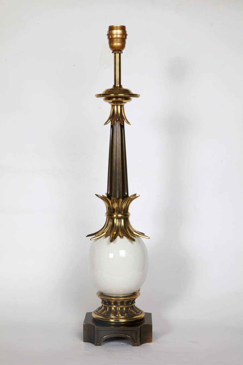 Pair of bronze and ceramic lamp in the manner of Maison Charles.
France
Dimensions given without shade
No shade provided