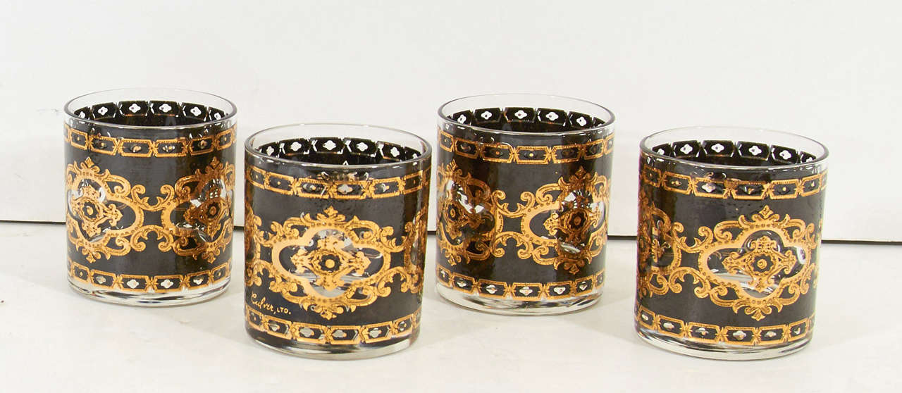 A vintage set of eight black and 24K gold ornate whiskey rocks glasses signed Culver EXC

Reduced from:  $700