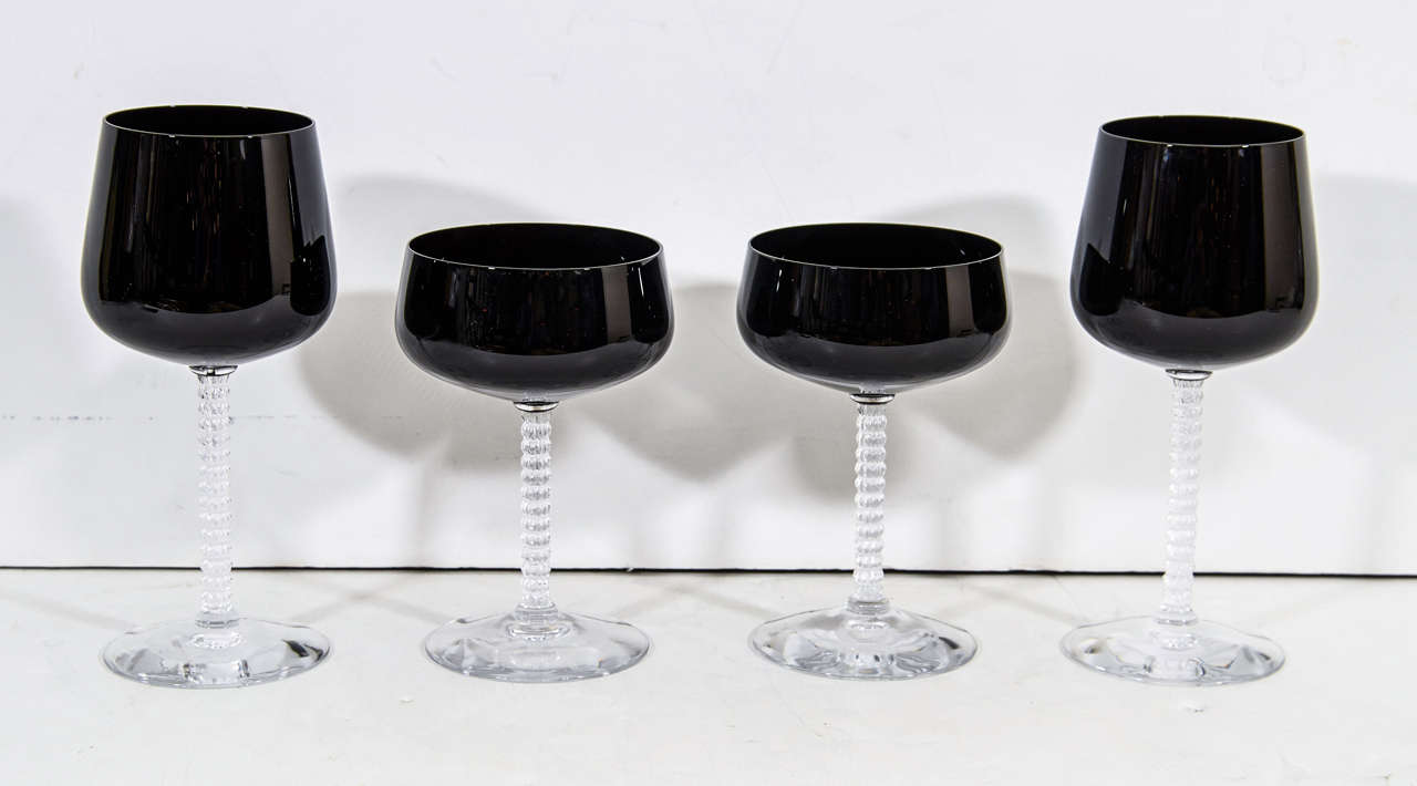 Hollywood Regency Fostoria stemware in black and crystal.  There are eight wine glasses measuring 8