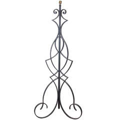 A Mid Century Wrought Iron Floor Lamp Attributed to Robert Merceris 1