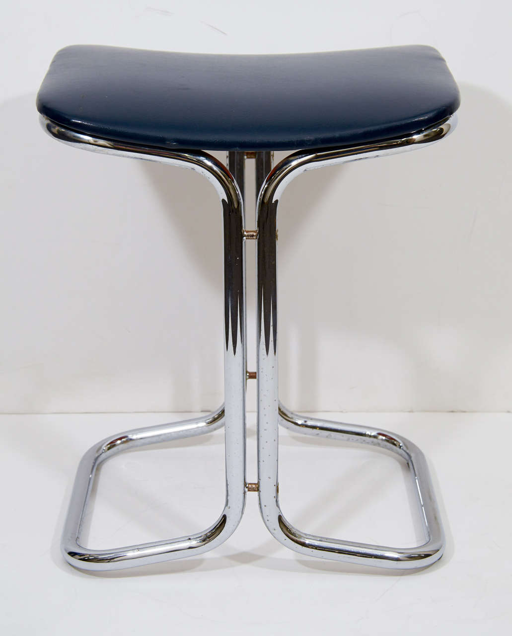 A Mid Century Set of Three Tubular Chrome Stools