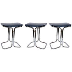 A Mid Century Set of Three Tubular Chrome Stools
