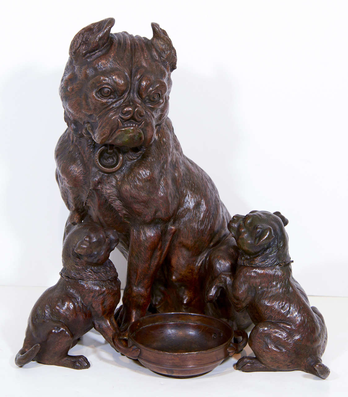 An Austrian 19th century patinated bronze humidor in the shape of a bulldog with two puppies. The piece is in good vintage condition with age appropriate patina.