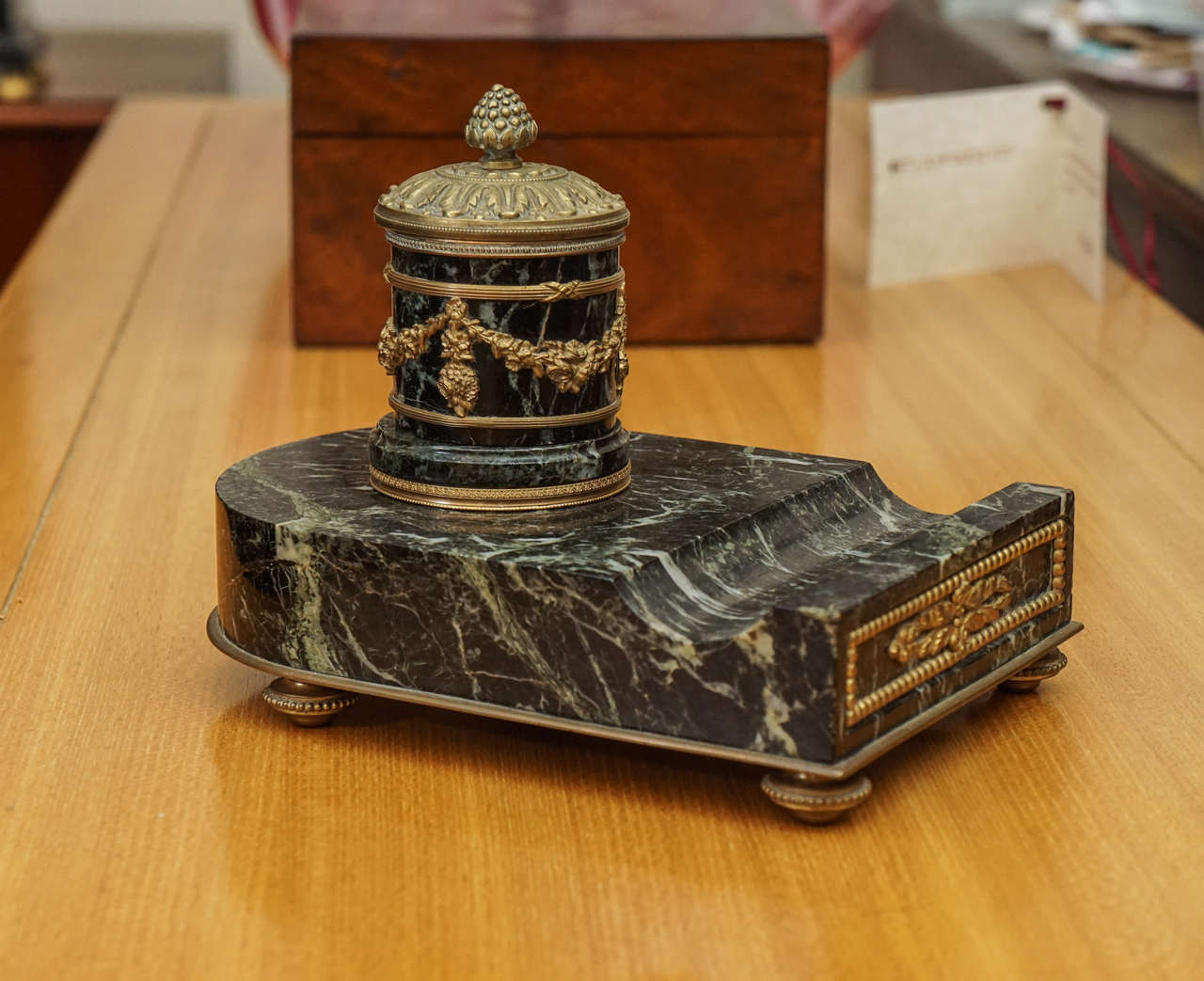 A French Empire marble and bronze inkwell.
