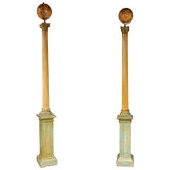 Two Tall Neoclassical Corinthian Columns with Globes on Top
