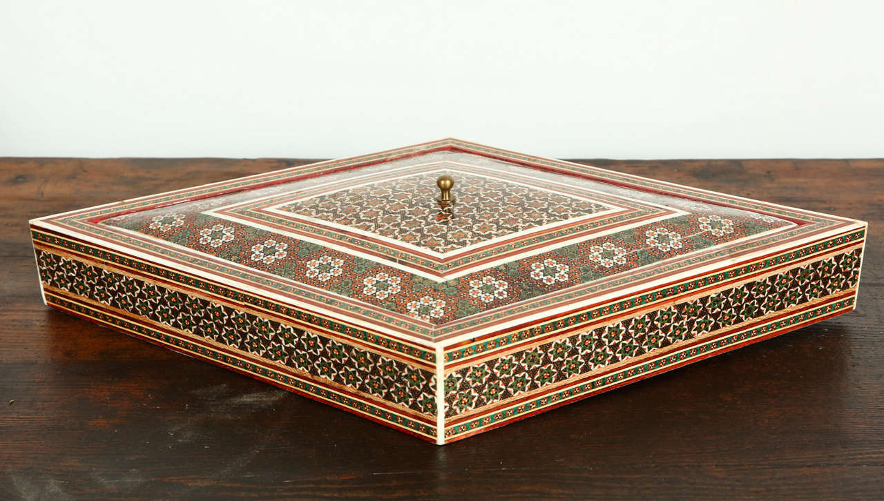 Anglo-Indian micro mosaic inlaid box with lid.
Intricate inlaid box with floral and geometric design in a lozenge form.