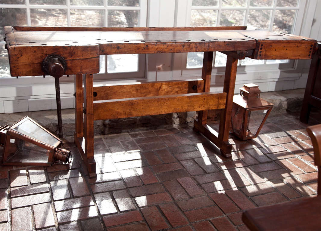 This antique maple work bench would make a great bar.  Not that one necessarily needs a large vise to crush ice, but the size of it and the shallow well on one side make it ideal for such a setup.  <br />
<br />
What truly sets this bench apart