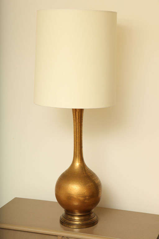 Pair of gold crackle-glazed urn shaped lamps 
c. 1950
