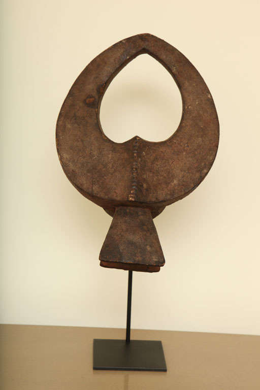 Harvest Mask (Water Buffalo) from the Mama Tribe, Nigeria.  Mounted on an iron stand, Early 20th Century