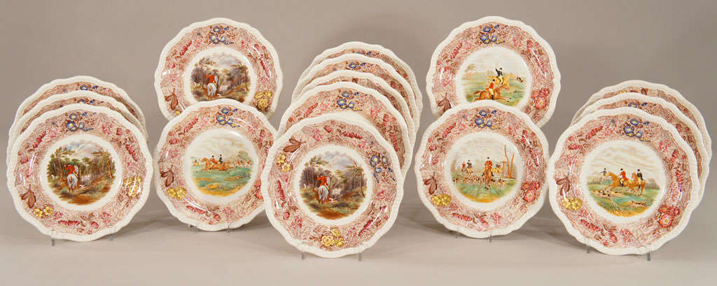 This beautiful set of Copeland Spode creamware plates with gadroon borders features hand painted polychrome enamel subjects over very detailed transfer outlines. The lovely hunt scenes are done after engravings by J.F. Herring. Depicting numerous