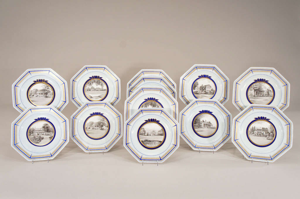 A wonderful set of 12 individually decorated octagonal cabinet plates depicting historical homes of America. Featuring subjects as John Quincy Adams, The White House, Monticello and others, these make a fabulous display in a library or conversation