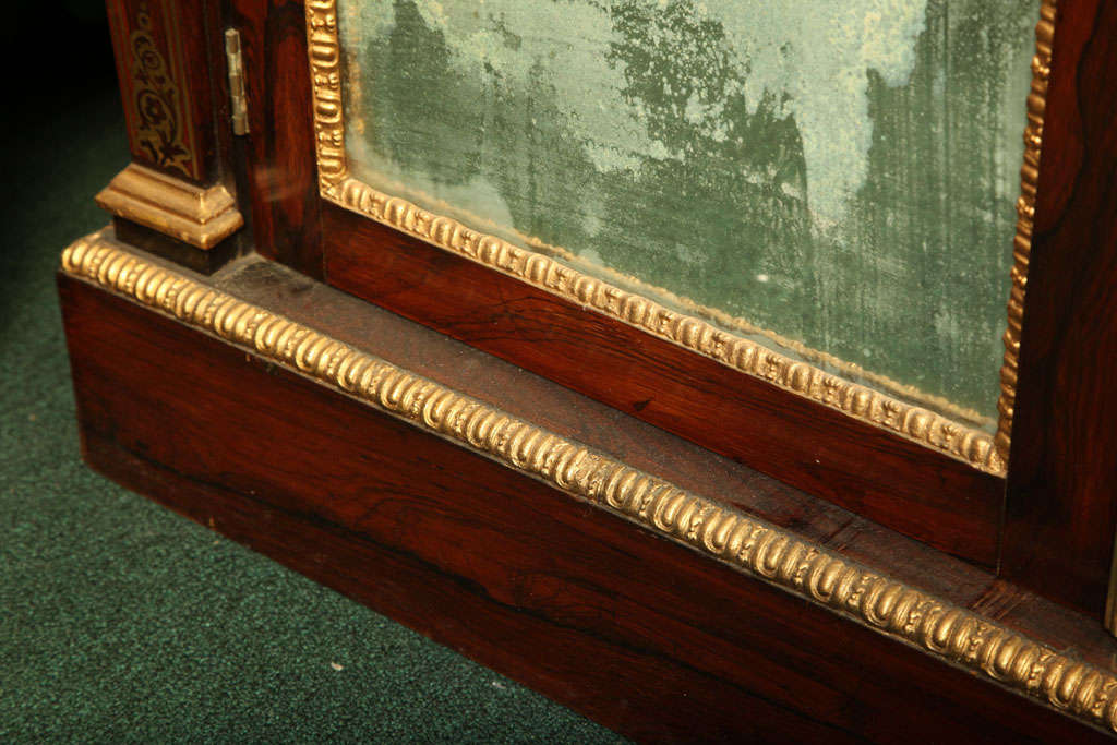Wood Regency brass inlaid marble top cabinet.