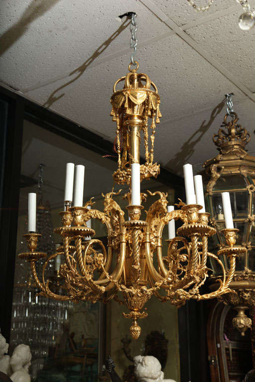 A very fine quality 19 century French Louis XVI style twelve-light chandelier with rams head motifs.
Stock Number: L14.