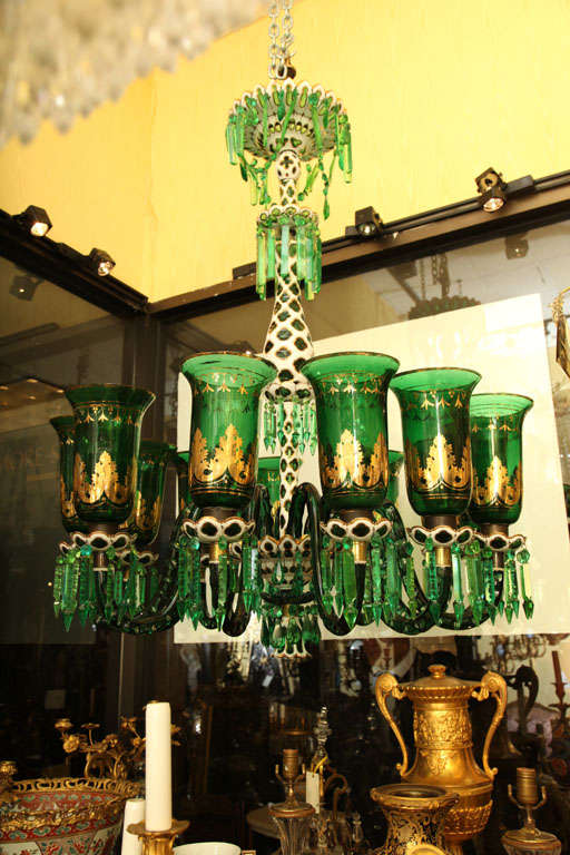 Very large and fine quality 19 century green, white and gilt glass overlay twelve-light chandelier with original Hurricane shades.
Attributed to F & C Osler, Birmingham, England.
Stock number: L13.
