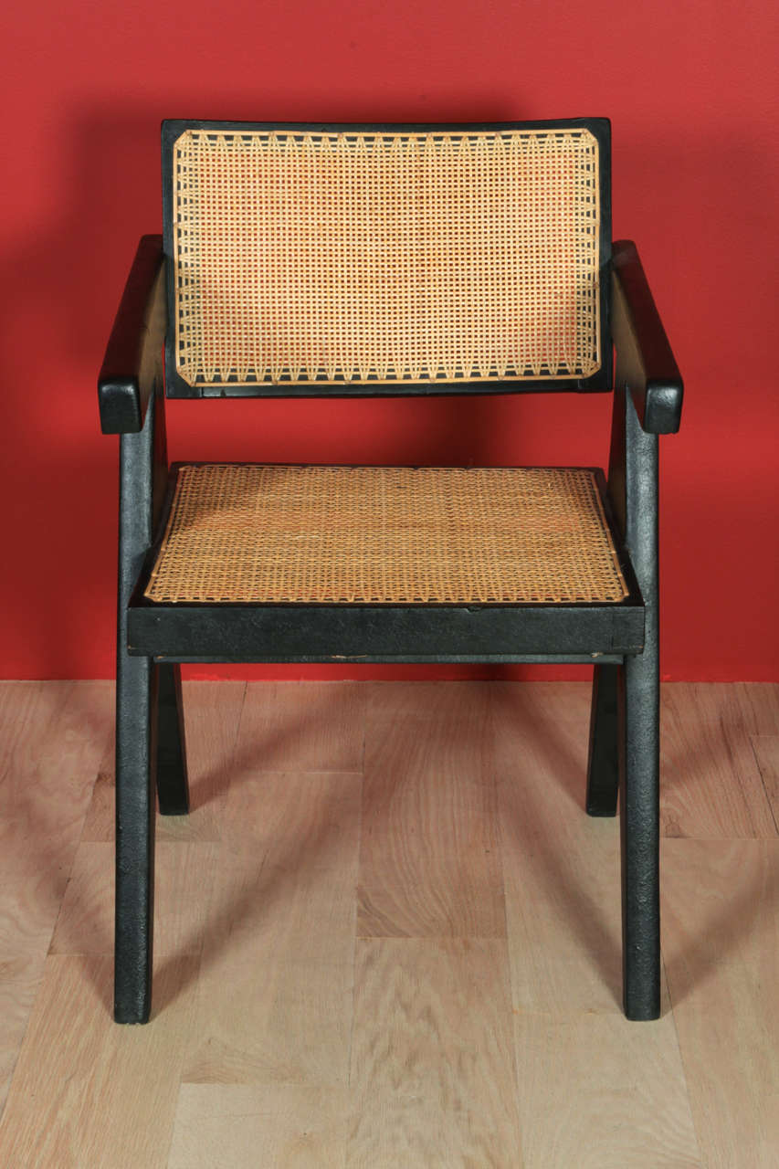 Model PJ SI 28-A chair in teak.

Provenance: Chandigarh.