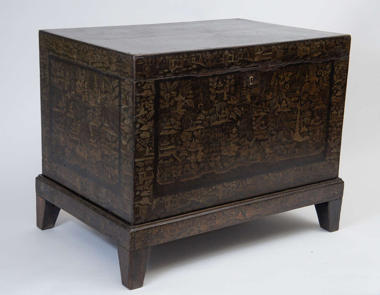 Wonderful c. 1820 Anglo-Indian lift-top chest on stand having original lacquer with all-over gilt Chinoiserie landscapes.  Interior retains original paint and pull out tray.