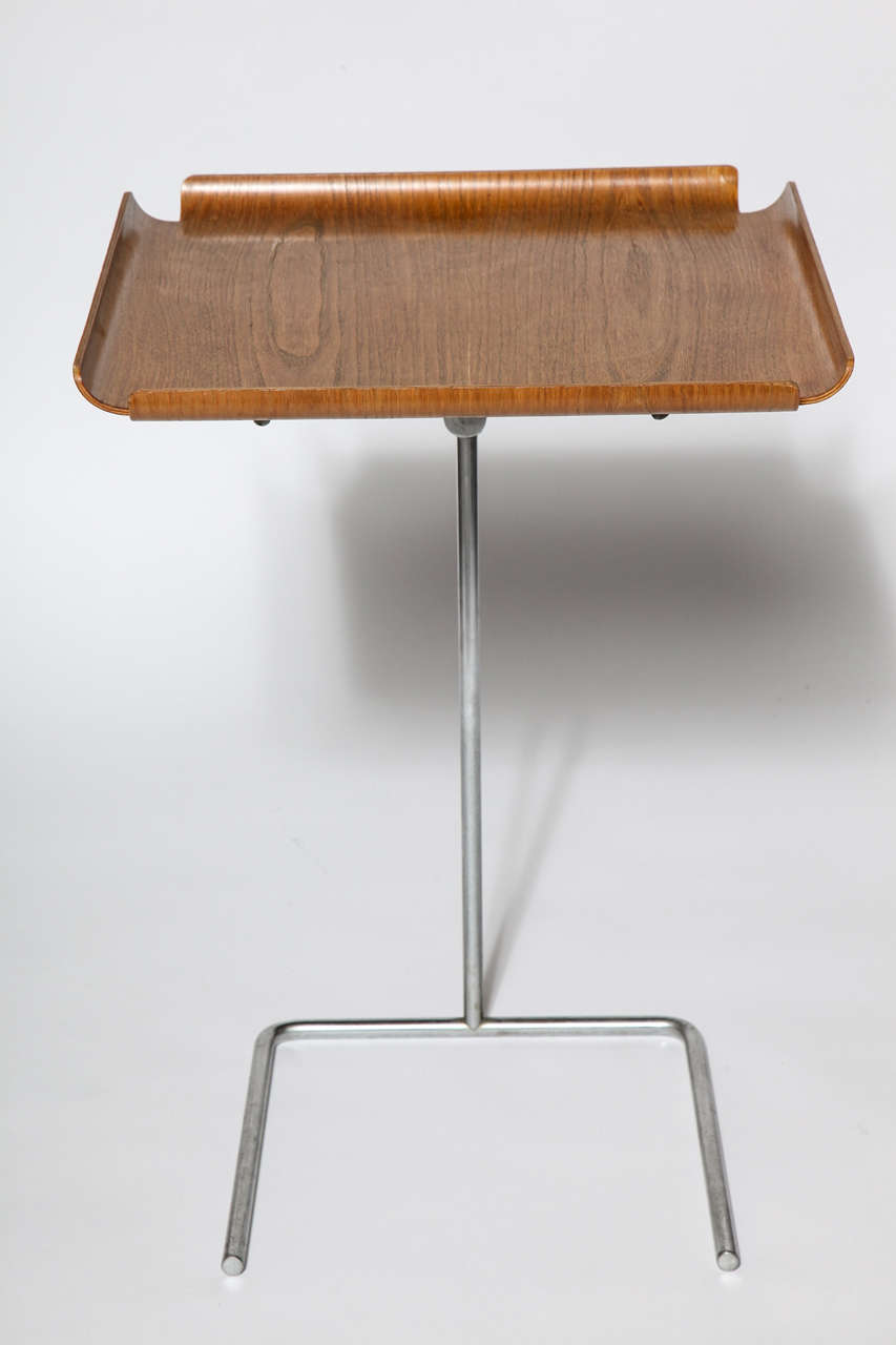 Vintage George Nelson side table with walnut plywood top and chrome plated steel base, manufactured by Herman Miller.