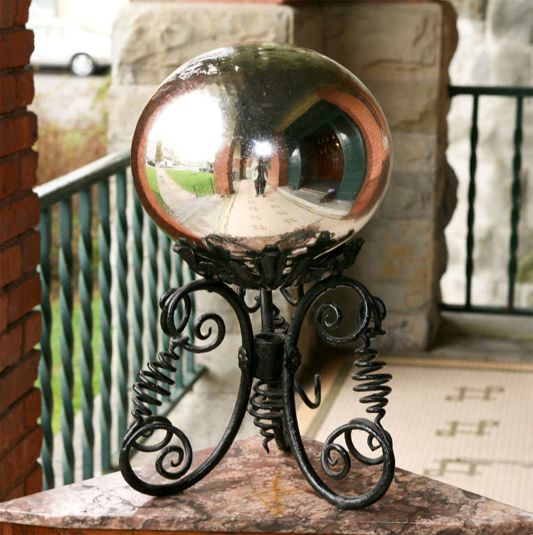 20th Century Handblown Mercury Glass Ball on Hand Wrought Iron Stand