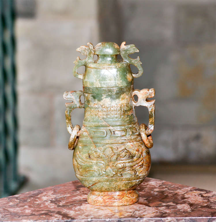 A Chinese Carved Jade Vase with Loose Ring Handles 1