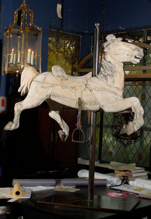 Thought to be made by the Herschell/Spillman Carousel Company, in North Tonawanda,NY. The horse mounted on a steel pole and stand. Overall height to the top of the pole: 60