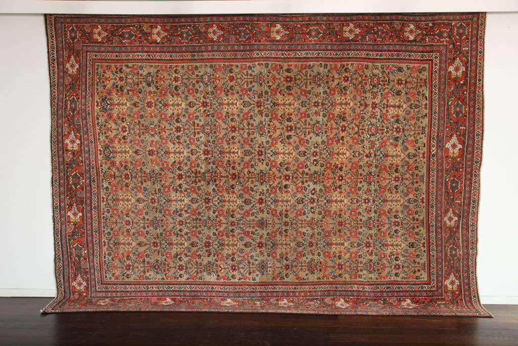 This Persian Sultanabad carpet consists of handspun wool and organic vegetable dyes, circa 1880. The size is 8'10
