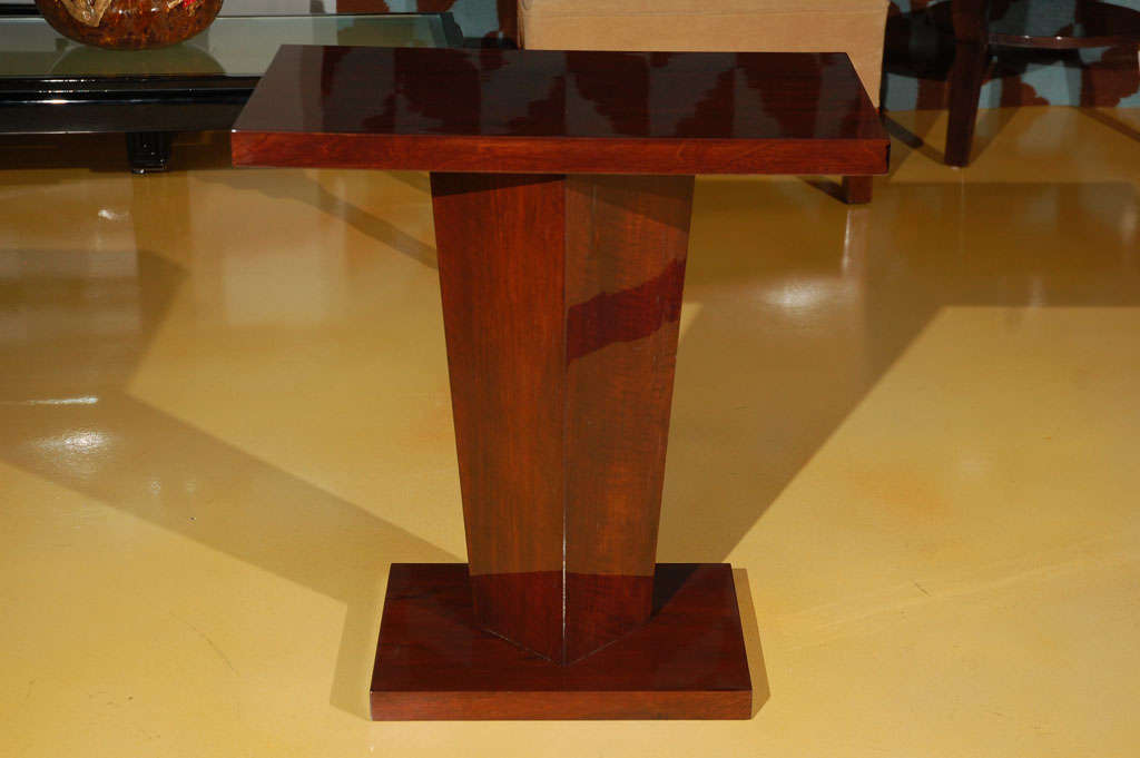 Art Deco rectangular lacquered palissander occasional table with tapered base.
