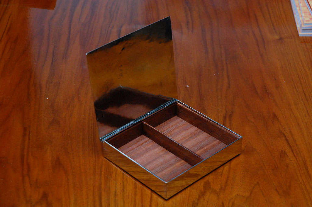 Hungarian silver plated box with wood lining and carved freeze on cover.