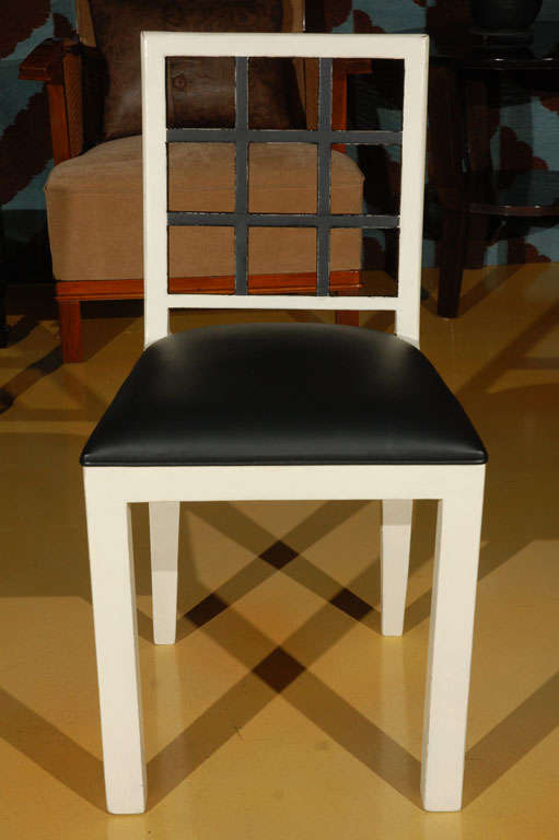 Hungarian Modern black and white painted chair with new black leather.