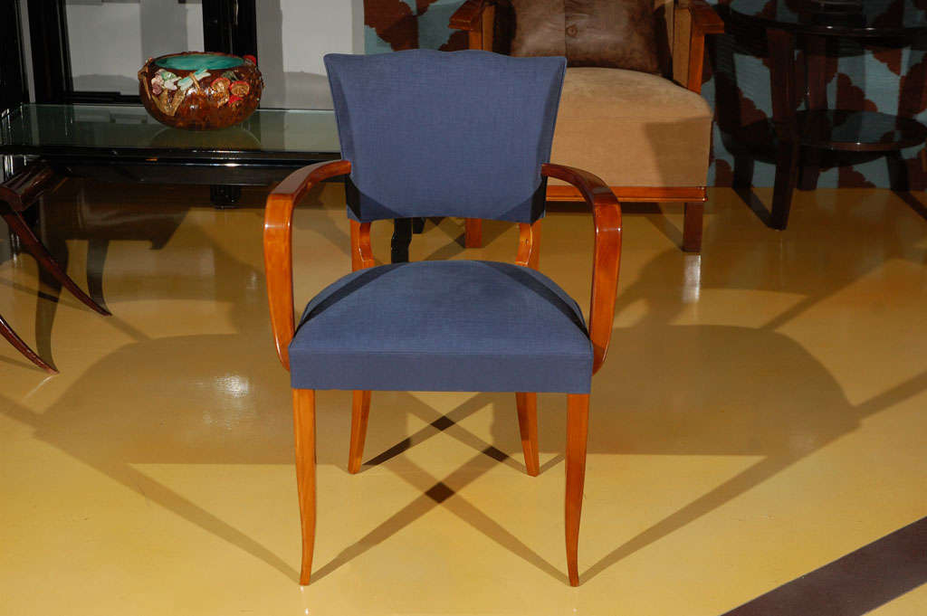Pair of late Hungarian Art Deco chairs, medium lacquered walnut and new fabric.