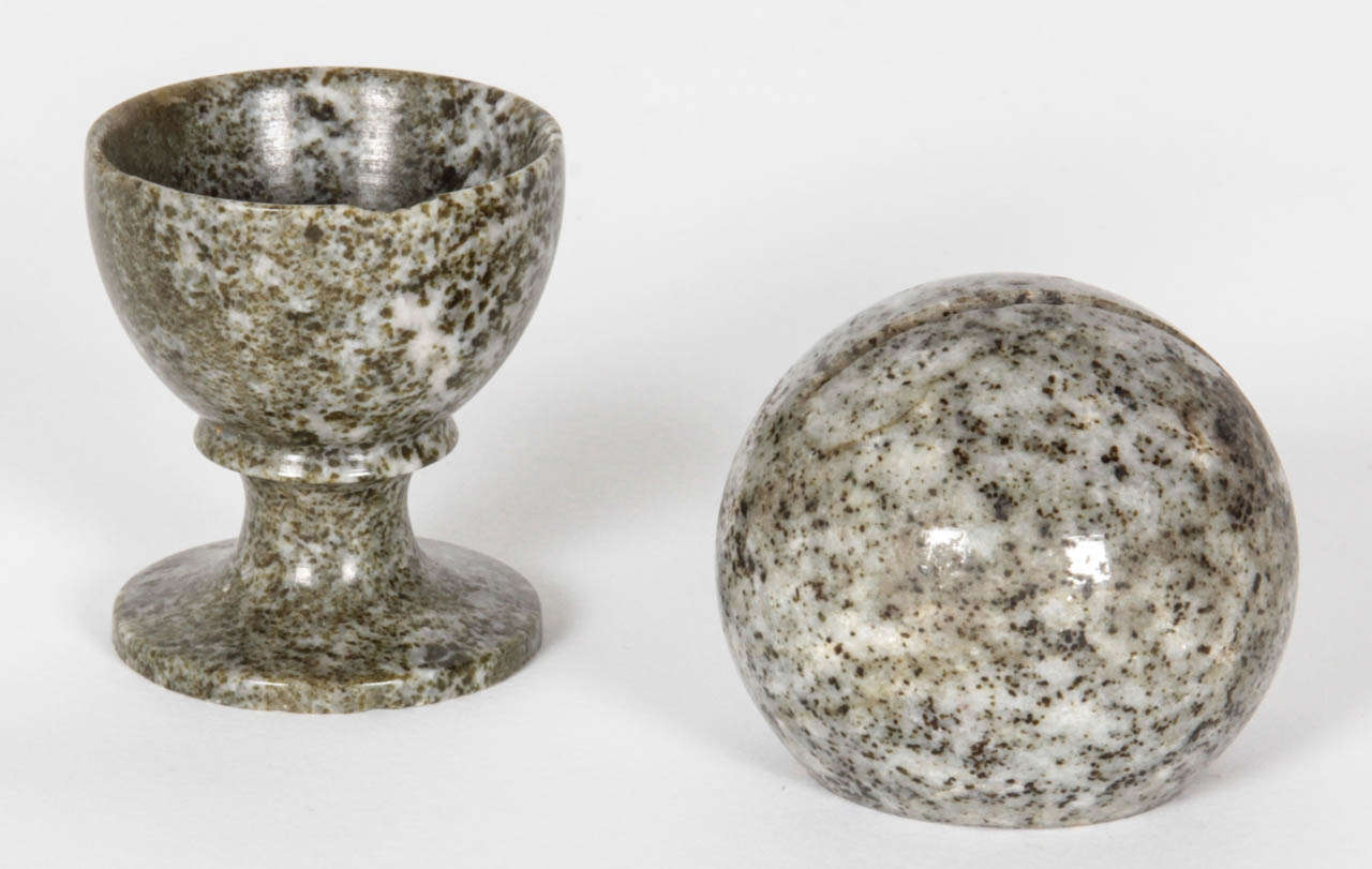 Three small small carved stone items, 20th Century,  eggcup and  two sphere with flat bottom and grooved top for cards.

Made of a Swedish Kolmard Marble.

Mined in Kolmarden, Ostergotland.