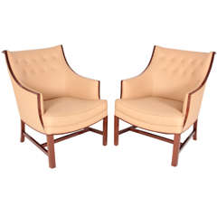 A Pair Of Frits Henningsen Armchairs