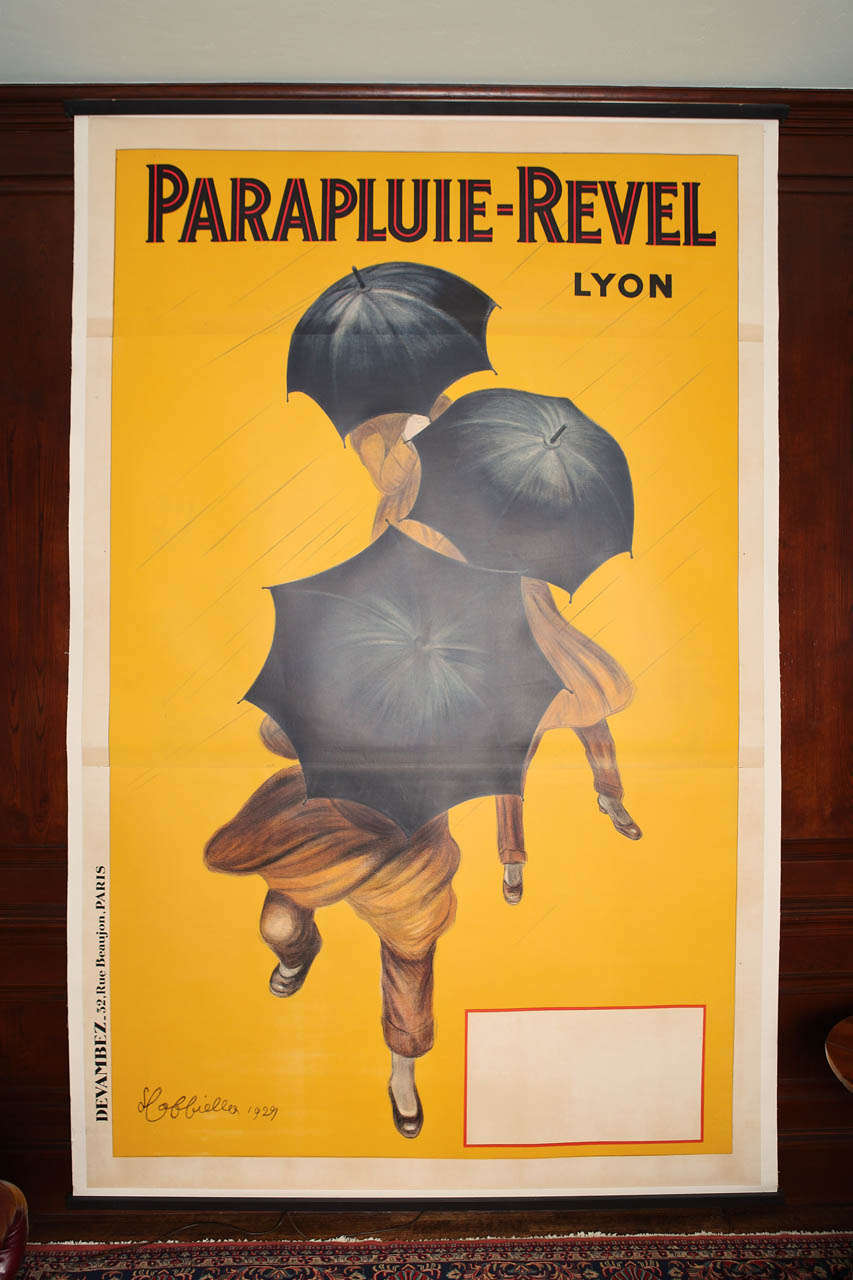 Tres grande classic Parapluie - Revel advertising poster by noted Italian artist Leonetto Cappiello, printed by Devambez.
Signed and dated in the plate, as pictured.  Open box bottom right, where the Gallery/Retailer's info would have been