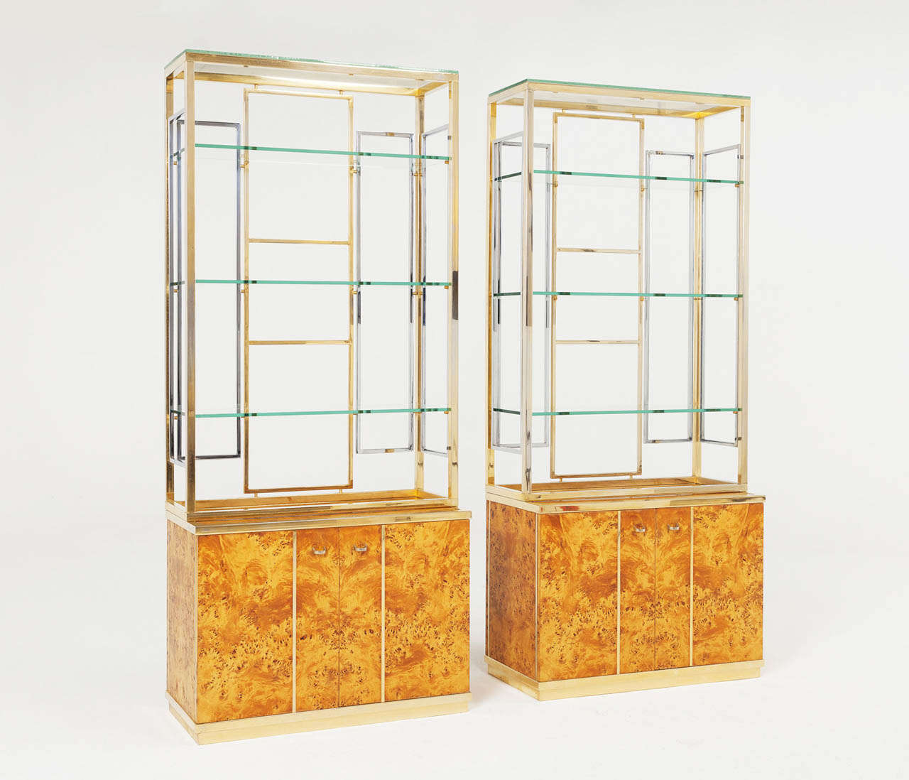 Cabinets, burl, brass and glass, Italy, ca. 1960.

These high cabinets have polished chrome and brass details and the cabinets are equipped with glass shelves.

Please note the price is per item.