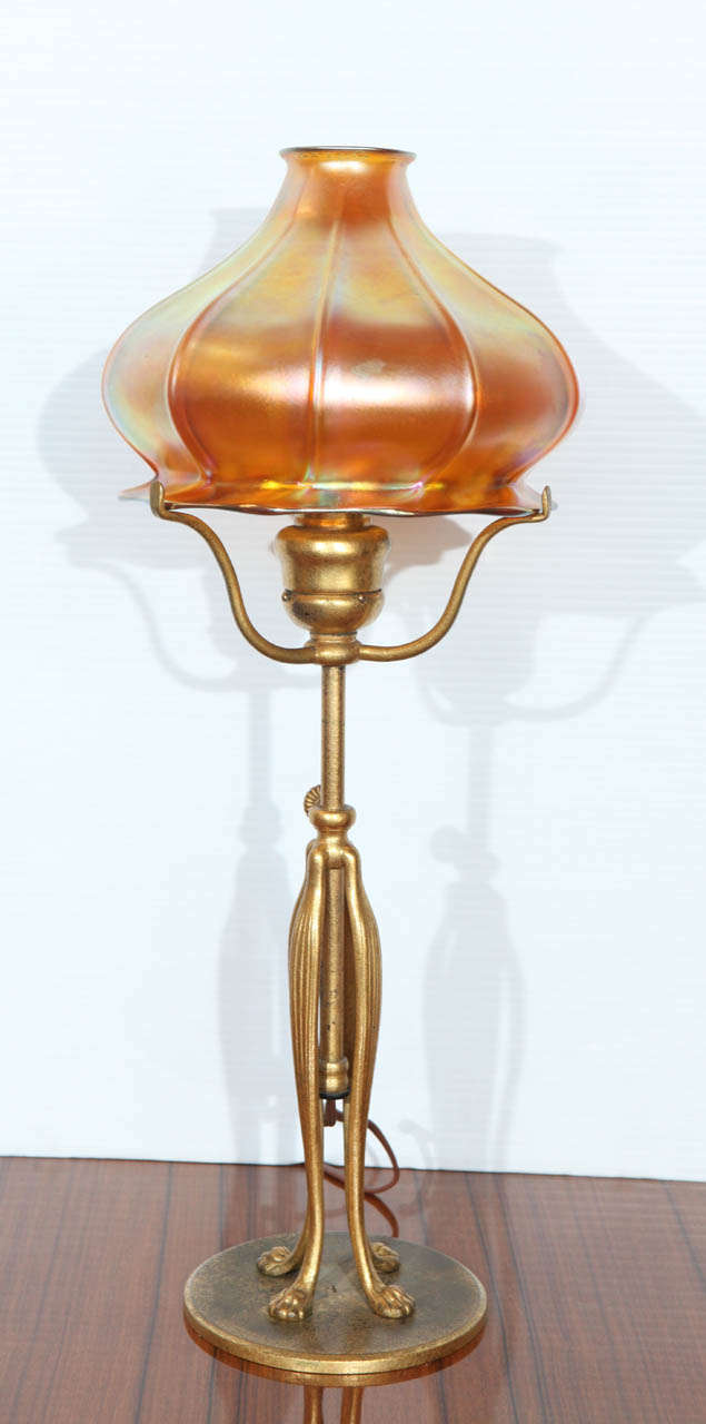 Stunning Tiffany Studios lamp base, with the mark. Together with a Quezal glass shade, signed