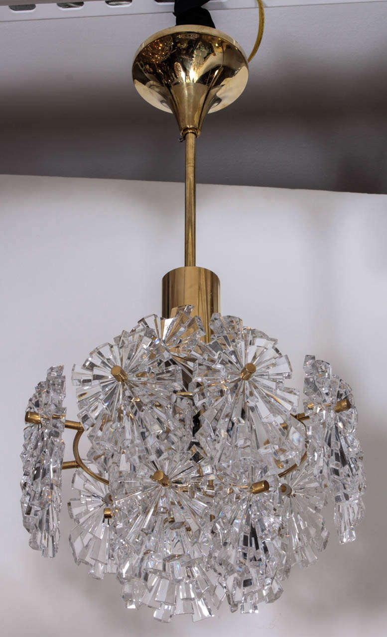 Fantastic 3 tier crystal chandelier in a Fireworks pattern on a brass armiture. Designed by Kinkeldey.