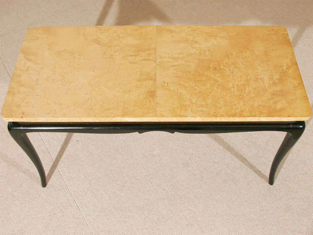 A Birds-Eye Maple Burr coffee table on ebonised base at ...