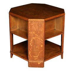 An Oak octagonal shaped Table-Bookcase by Heals of London