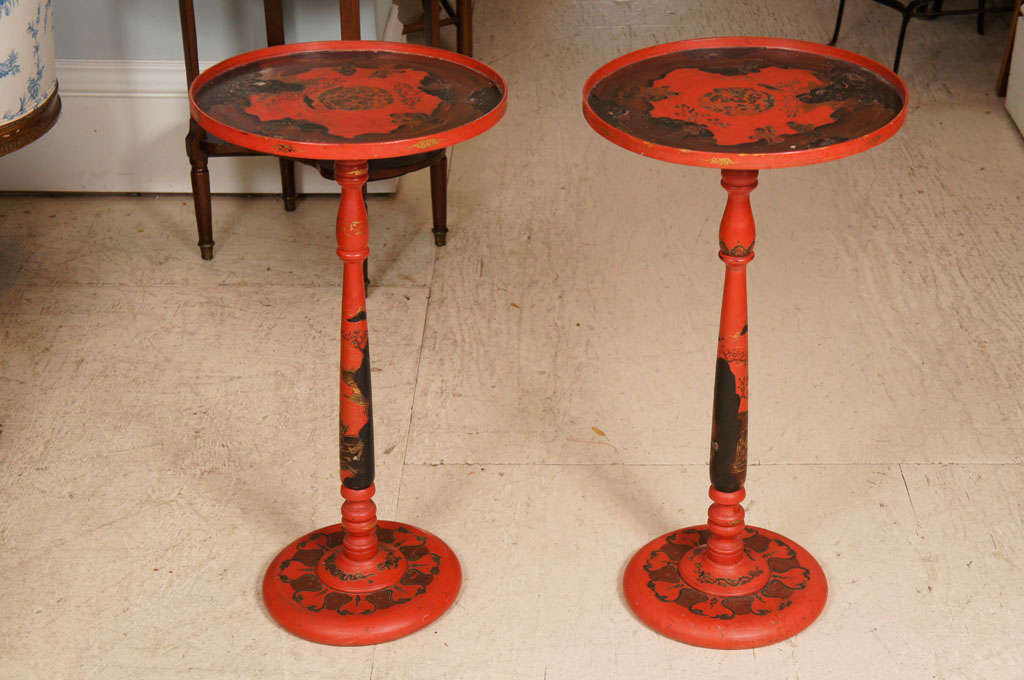Pair red lacquer round end tables with Chinese style decoration.Mother of pearl inlay decoration.  Probably art deco.
