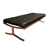 Black leather button tufted Nicos Zographos bench