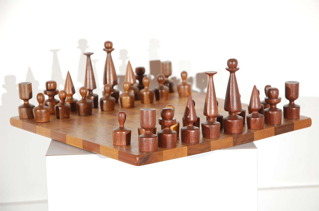 Walnut and mahogany chessboard by Arthur 