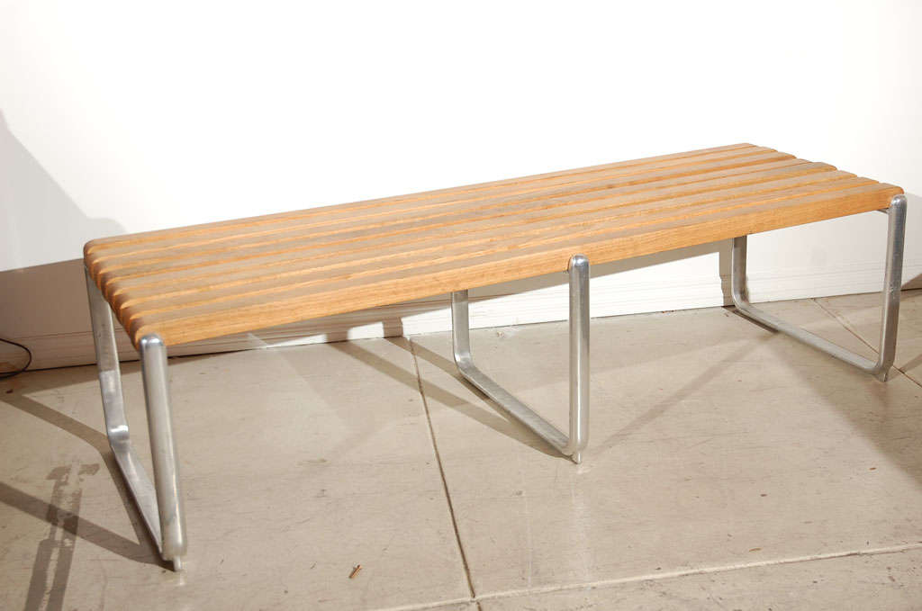 These Aluminum and oak benches were used at LAX in the late 70's.  Design by Pasadena based John Caldwell.