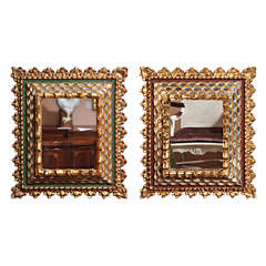 A Pair of Spanish Colonial Style Parcel Gilt Mirrors