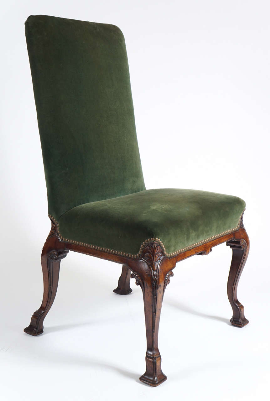 Elegant English Edwardian period backstool or side chair based on original examples supplied to Sir Robert Walpole (1676-1745) for Houghton Hall in Norfolk, England and attributed to the Roberts family of cabinet makers.  This chair in George I