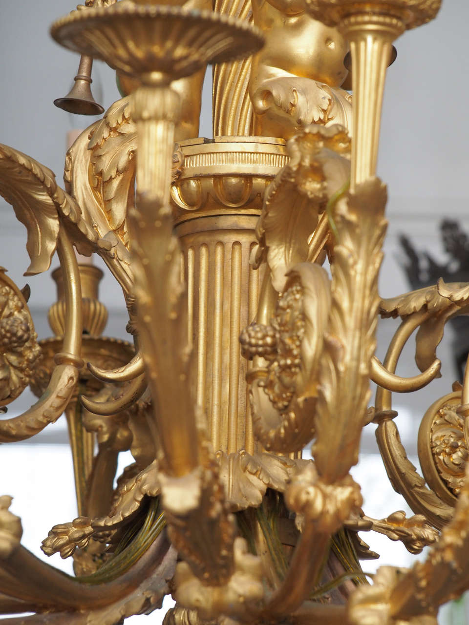 Forged Large Bronze Chandelier with Cherub Decoration